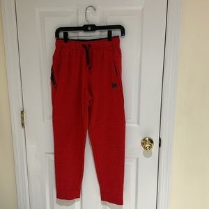 Sweatpants from Russel size 18 (boys) color red and black.